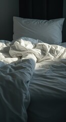 Peaceful morning light illuminates a deeply comfortable bed with white linen and thick blankets, inviting rest and relaxation and a slow start to the day ,morning ,fluffy ,sleep