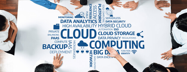 Diverse Team Collaborating on Cloud Computing Concepts with Visual Elements Representing Data Analytics, Cloud Storage, and Service Models in Modern Business Environment. Amity