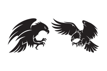 Obraz premium Two fierce black eagles in mid flight silhouette