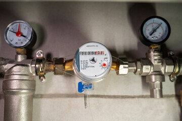 Analog gauge detect and reflect water pressure change with calibrated pointer on circular display. Residential plumbing monitor, mechanical indicator, fluid force measurement tool, household utility