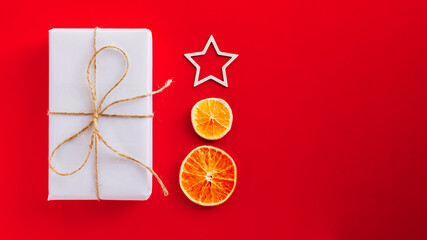 Collection of Christmas objects - gift box, frame, eve fir, dried orange, pine cone, star. New Year...