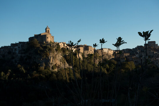 silhouette of a monastery