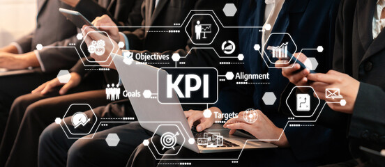 Asian job applicant in identical formal wear sitting in waiting room for job interview. Office worker or business people working in cramped room together using laptop and phone. Trailblazing Amity