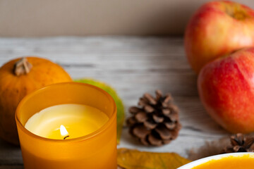 Cozy Autumn Still Life with Candle and Pumpkin