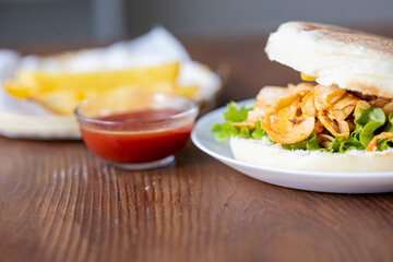 Close-Up of Turkish Chicken Doner Served with French Fries in Bread