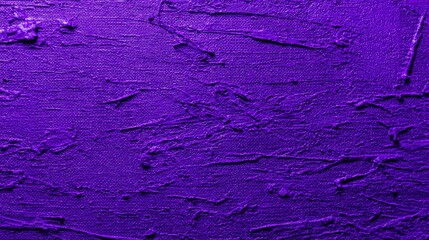 Obraz premium Rich purple acrylic paint texture applied heavily to a woven fabric surface
