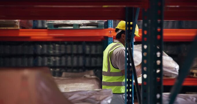 Distribution, dancing and man in warehouse, clipboard and job promotion with logistic goals. Person, movement and employee in workplace, achievement or celebration with bonus, supply chain or excited