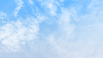 Blue pastel sky with white fluffy cloud. Cumulus clouds background. Cloudscape morning sky. The concepts of freedom of life, never give up and positive though energy.