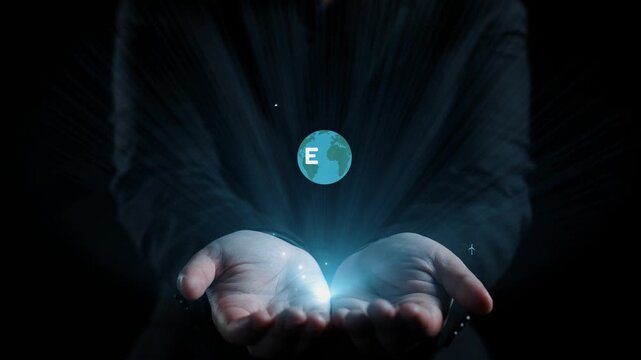 Hands showcase various ecological symbols and icons, representing renewable energy and sustainability in a modern, digital format, emphasizing environmental conservation. Qubit