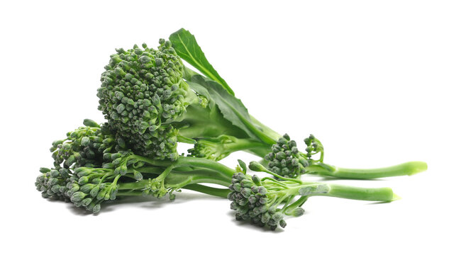 Fresh broccoli pile isolated on white background, side view