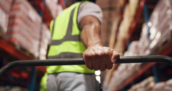 Trolley, handle and hand of industry worker in warehouse for cargo, industrial or freight delivery. Distribution, pallet jack and male supply chain employee with inspection for shipping from below.