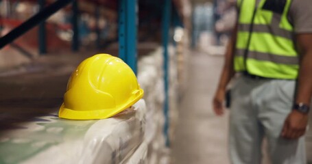 Hands, helmet and warehouse inspection with logistics, shelf and safety check with inventory management. Person, engineer and walk with ppe, hardhat and career with shipping at distribution plant