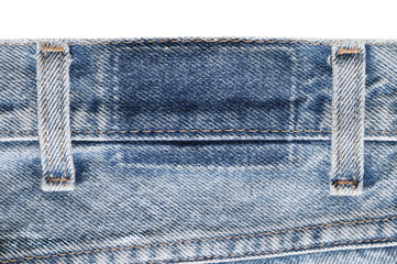 Denim blue jeans removed brand label tag patch traces, large detailed isolated blank empty textured horizontal background macro closeup, old worn garment farbric pattern backdrop
