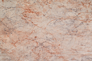 Natural salmon pink colored cotton cloth, large detailed pale pinkish-orange casual print textile background closeup, horizontal textured vintage coral beige marble pattern, fabric swatch copy space