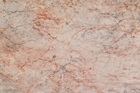 Natural salmon pink colored cotton cloth, large detailed pale pinkish-orange casual print textile background closeup, horizontal textured vintage coral beige marble pattern, fabric swatch copy space