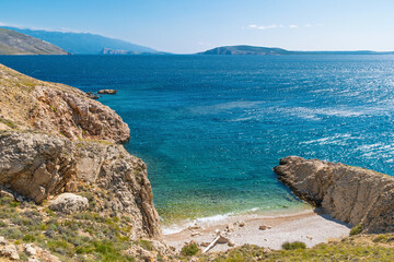 Scenic coastal view with rocky cliffs and blue sea