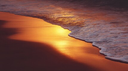 Serene Sunset Reflection on Wet Sandy Beach with Gentle Waves and Soft Warm Tones Creating a Tranquil Coastal Atmosphere