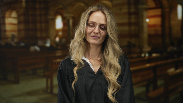 Young blonde woman judge in uniform stands indoors in a church, embodying law and solemnity with a peaceful demeanor and a traditional setting enhancing the solemnity of the image.