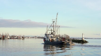 Richmond, Canada – January 23, 2021. Fishing Seiner Returning Steveston Harbor 4K UHD
Richmond, Canada – January 23, 2021. A seine boat returns to Steveston Harbor from Georgia Strait. 4K UHD.. 
