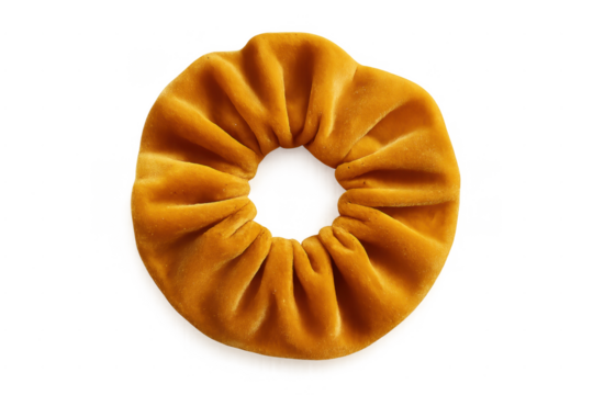 Yellow velvet scrunchie hair accessory on transparent background