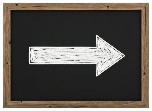 Hand drawn chalk arrow pointing right on a classic school blackboard