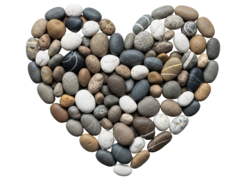 Heart shape formed by natural smooth pebbles and stones, symbolizing love and nature