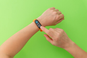 Smart band showing a wellness reminder on a bright green background, highlighting stress awareness, daily balance, and mindful technology use for modern lifestyles