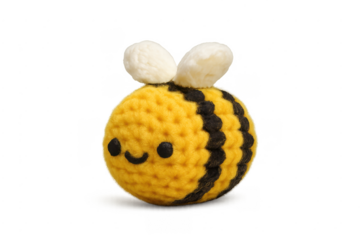 Amigurumi bee toy with smiling face and wings