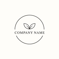 Elegant minimalist logo with two leaves inside a circle.