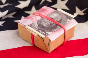 a parcel with US and Chinese money