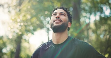 Thinking, hiking and man in woods, fitness and daydreaming with environment, smile and countryside. Happy, hiker or healthy person in forest, contemplation and adventure with eco tourism and trekking