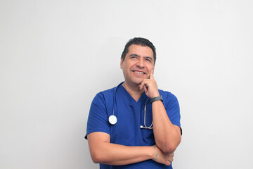Dark-skinned Latino male doctor specialist with a stethoscope shows pride and success in his work for the health of patients