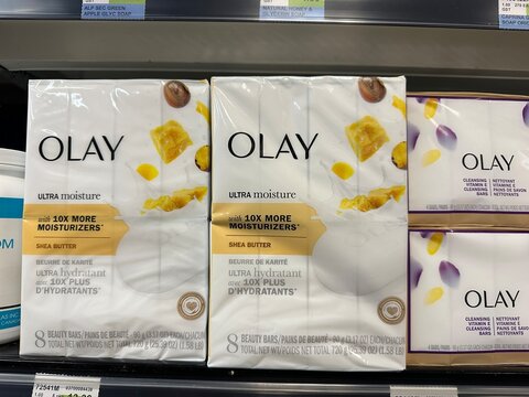 Olay Ultra Moisture and cleansing bar soaps displayed on a retail store shelf, featuring shea butter and moisturizing formulas. November 14 2025, Alberta Canada.