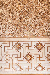 Geometric plasterwork and floral patterns at Alhambra in Granada