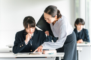 Elementary school students, junior high school students, high school students, and female high school students receiving guidance from teachers, lecturers, and instructors in school classes and cram s