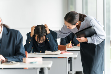 Fototapeta premium Cram school, school class, feeling unwell, worried high school girl, junior high school student, high school student, elementary school student 