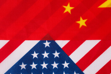 Chinese and US flags combined on background