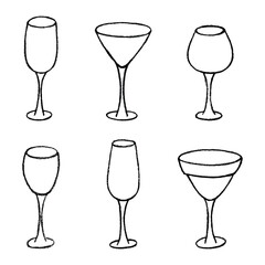 Set of hand drawn wine and champagne glasses Alcohol drink clipart in doodle style Single element for print, web, design, decor Happy New Year