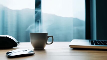 Morning coffee and laptop on desk in modern office workspace - Powered by Adobe