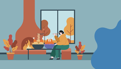 Enjoying warm food by the fireplace Cozy indoor autumn or winter dining concept