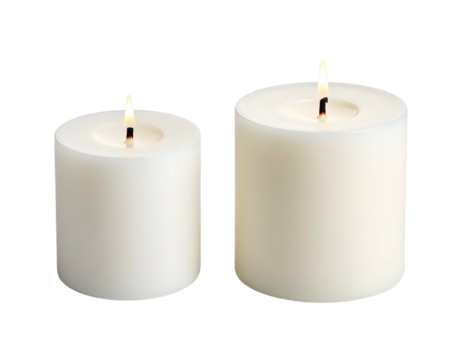 Two lit white pillar candles, one smaller than the other
