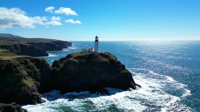 Iconic Lighthouse Standing Tall on Rocky Cliffs Overlooking a Breathtaking Ocean Vista