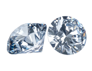 Two sparkling, cut gemstone facets reflect bright light