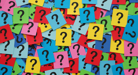 A colorful arrangement of sticky notes in various colors, each marked with a bold black question mark.