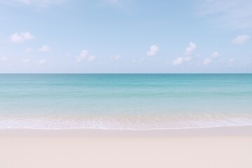Fototapeta premium Serene Beach Scene with Turquoise Water and Soft White Sand Under a Clear Sky