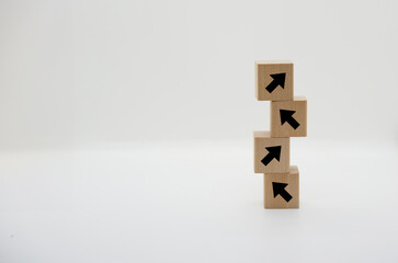 Stack of Wooden Blocks with Arrow Symbol