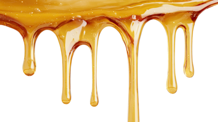 Dripping golden syrup, caramel, or honey against a dark background