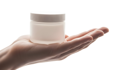 Hand holding cosmetic cream jar, close-up studio shot on white background
