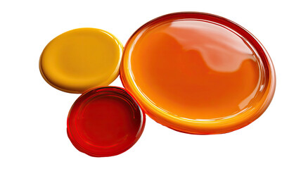 Three colorful, shiny circular gel-like forms on a black background