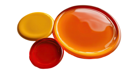 Three colorful, shiny circular gel-like forms on a black background